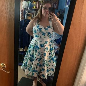 White dress with blue flowers